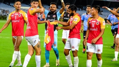 East Bengal players celebrate the win. 