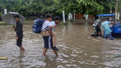 A waterlogged road in Gurugram on Thursday. (PTI) A waterlogged road in Gurugram on Thursday. (PTI)