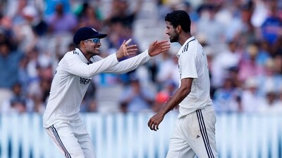 Washington Sundar celebrates a wicket with Indian captian Shubman Gill. (Action Images via Reuters)