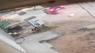The incident was captured on a CCTV that showed a car running over a man in white T-shirt and then fleeing from the spot. (PTI screen grab)
