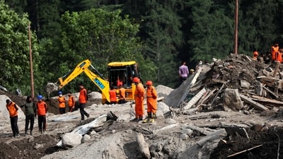 11 bodies of the victims and one body part were also brought to the hospital mortuary from the cloudburst-hit Chisoti village. (PTI) 11 bodies of the victims and one body part were also brought to the hospital mortuary from the cloudburst-hit Chisoti village. (PTI)