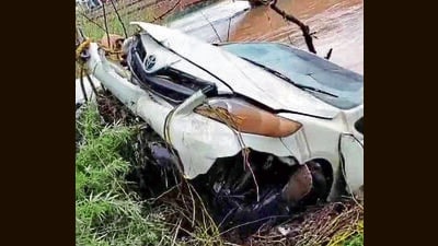 The car was pulled out from the canal with the help of a crane several hours after the accident. (HT Photo)