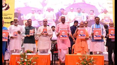 UP CM Yogi Adityanath releasing dy CM Brajesh Pathak’s book on former PM Atal Bihari Vajpayee in Lucknow. (HT photo) UP CM Yogi Adityanath releasing dy CM Brajesh Pathak’s book on former PM Atal Bihari Vajpayee in Lucknow. (HT photo)