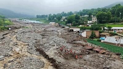 Rescue workers search for survivors after a flash flood in Yuzhong county, in China�s northwest Gansu province on August 8, 2025. (AFP)