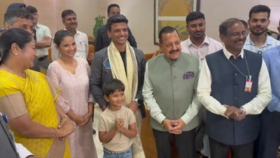 Group Captain Shubhanshu Shukla clicks a picture with Union MoS for Science and Technology, Dr Jitendra Singh and Delhi CM Rekha Gupta, with his wife, Kamna Shukla, and son. (ANI)