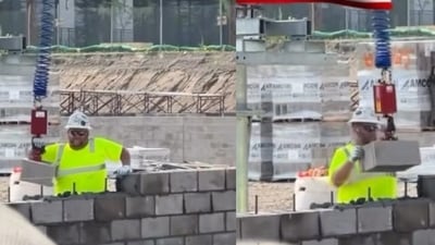 A TikTok video showing US workers using machines to lift bricks sparked debate. (TikTok/@mickystickey) A TikTok video showing US workers using machines to lift bricks sparked debate. (TikTok/@mickystickey)