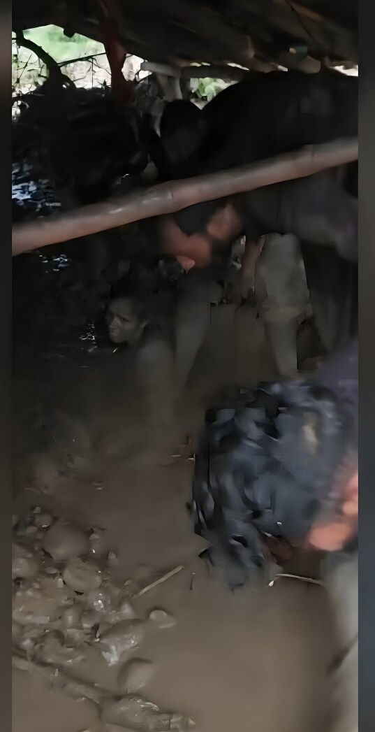 Locals rescuing a woman buried under debris in Ghati area of Kathua, where flash floods struck in the early hours of Sunday, August 17. (Image: Sourced/HT) Locals rescuing a woman buried under debris in Ghati area of Kathua, where flash floods struck in the early hours of Sunday, August 17. (Image: Sourced/HT)
