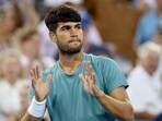 Carlos Alcaraz reacts after beating Alexander Zverev in the Cincinnati Open semi-finals. The Spanish star will partner Britain’s Emma Raducanu in the revamped US Open mixed doubles this week. (AFP Photo) Carlos Alcaraz reacts after beating Alexander Zverev in the Cincinnati Open semi-finals. The Spanish star will partner Britain’s Emma Raducanu in the revamped US Open mixed doubles this week. (AFP Photo)
