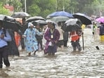 Mumbai, India - Aug. 18, 2025:School children make their way through water logged on Tilak Rd, near Khodadad Cricle at Dadar TT, in Mumbai, India, on Monday, August 18, 2025. (Photo by Anshuman Poyrekar/ Hindustan Times) (Hindustan Times) Mumbai, India - Aug. 18, 2025:School children make their way through water logged on Tilak Rd, near Khodadad Cricle at Dadar TT, in Mumbai, India, on Monday, August 18, 2025. (Photo by Anshuman Poyrekar/ Hindustan Times) (Hindustan Times)