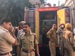Police and firefighters at the site after a fire broke out in an electronics shop, in west Delhi's Raja Garden, Monday, Aug. 18, 2025. Police and firefighters at the site after a fire broke out in an electronics shop, in west Delhi's Raja Garden, Monday, Aug. 18, 2025.