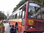 Pune, India - September 10, 2018: PMPML workers try to replace the tyre after the bus was punctured by Bharat Band supporters on Paud road near Kinara hotel in Pune, India, on Monday, September 10, 2018. (Photo by Sanket Wankhade/HT PHOTO)