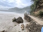 Swollen Sutlej washed away a section of Sunni-Tatapani road connecting Mandi district to Shimla on Monday. (HT Photo) Swollen Sutlej washed away a section of Sunni-Tatapani road connecting Mandi district to Shimla on Monday. (HT Photo)