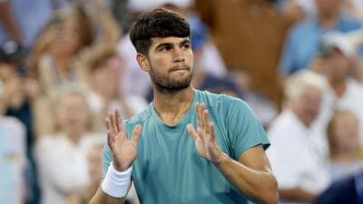 Carlos Alcaraz reacts after beating Alexander Zverev in the Cincinnati Open semi-finals. The Spanish star will partner Britain’s Emma Raducanu in the revamped US Open mixed doubles this week. (AFP Photo) Carlos Alcaraz reacts after beating Alexander Zverev in the Cincinnati Open semi-finals. The Spanish star will partner Britain’s Emma Raducanu in the revamped US Open mixed doubles this week. (AFP Photo)