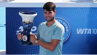 Carlos Alcaraz wins the Cincinnati Open after Jannik Sinner retires in the first set because of illness. (Getty Images via AFP) Carlos Alcaraz wins the Cincinnati Open after Jannik Sinner retires in the first set because of illness. (Getty Images via AFP)
