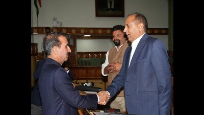 Chief minister Sukhvinder Singh Sukhu meets leader of Opposition Jai Ram Thakur on the first day of Himachal Pradesh Vidhan Sabha monsoon session in Shimla on Monday. (HT Photo)