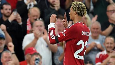 Liverpool's new striker Hugo Ekitike holds up his hands to gesture the late Diogo Jota’s jersey number 20 after scoring on his Premier League debut for the defending champions againt Bournemouth on Friday. (REUTERS) Liverpool's new striker Hugo Ekitike holds up his hands to gesture the late Diogo Jota’s jersey number 20 after scoring on his Premier League debut for the defending champions againt Bournemouth on Friday. (REUTERS)