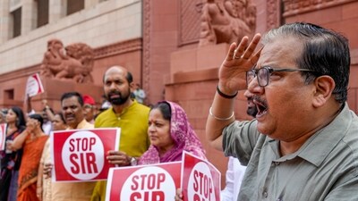 RJD MP Manoj Jha with other parliamentarians from the INDIA bloc parties at a protest against the Election Commission's Special Intensive Revision (SIR) of electoral rolls in Bihar, outside Parliament in New Delhi on Monday. (PTI) RJD MP Manoj Jha with other parliamentarians from the INDIA bloc parties at a protest against the Election Commission's Special Intensive Revision (SIR) of electoral rolls in Bihar, outside Parliament in New Delhi on Monday. (PTI)