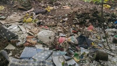 Water bodies covered with garbage and soil at Khala road in Udyog Vihar. (HT Photo) Water bodies covered with garbage and soil at Khala road in Udyog Vihar. (HT Photo)