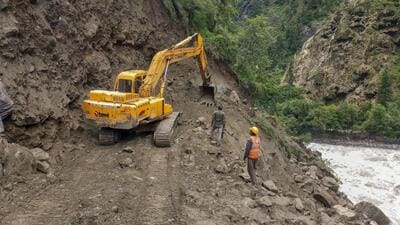 Work underway to repair a damaged portion of Gangotri National Highway, in Uttarkashi district, on Monday. (PTI) Work underway to repair a damaged portion of Gangotri National Highway, in Uttarkashi district, on Monday. (PTI)
