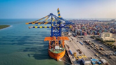 A cargo ship anchored at the Adani Group-owned Mundra port in Gujarat. (PTI) A cargo ship anchored at the Adani Group-owned Mundra port in Gujarat. (PTI)