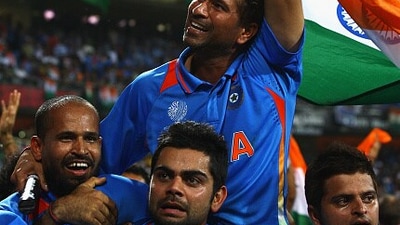 Virat Kohli famously lifted Sachin Tendulkar on his shoulders after India ended a 28-year-long wait to win the World Cup. This was India's second 50-over World Cup win after 1983. (AFP ) Virat Kohli famously lifted Sachin Tendulkar on his shoulders after India ended a 28-year-long wait to win the World Cup. This was India's second 50-over World Cup win after 1983. (AFP )