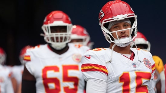 Kansas City Chiefs quarterback Patrick Mahomes waits with teammates to walk on to the field. (AP)