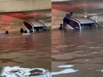 A flooded Thane underpass left an SUV stranded.