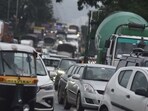 Officials attributed the gridlock to low visibility, waterlogging in certain areas, and a surge in vehicle volume. (MAHENDRA KOLHE/HT PHOTO)