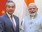 Prime Minister Narendra Modi with Chinese Foreign Minister Wang Yi during a meeting, in New Delhi. (@narendramodi via PTI)
