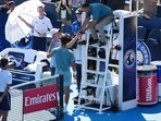 Jannik Sinner meets with Carlos Alcaraz and umpire Mohamed Lahyani to retire from the men's singles finals of the Cincinnati Open Jannik Sinner meets with Carlos Alcaraz and umpire Mohamed Lahyani to retire from the men's singles finals of the Cincinnati Open