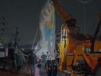 In Hyderabad’s Bandlaguda area, a Lord Ganesh idol being transported in a vehicle came into contact with high-tension wires.