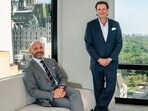 Dominari Holdings CEO Anthony Hayes, sitting, and President Kyle Wool at Trump Tower in New York.