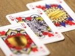 Genderless playing cards designed by Indy Mellink lie on a table in Oegstgeest, Leiden, Netherlands.