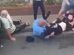 One of the victims can be seen in the video laying on the floor without his turban, while another can be seen getting kicked and punched. One of the victims can be seen in the video laying on the floor without his turban, while another can be seen getting kicked and punched.