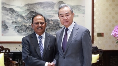 File photo of Chinese foreign minister Wang Yi with national security advisor (NSA) Ajit Doval (AP) File photo of Chinese foreign minister Wang Yi with national security advisor (NSA) Ajit Doval (AP)