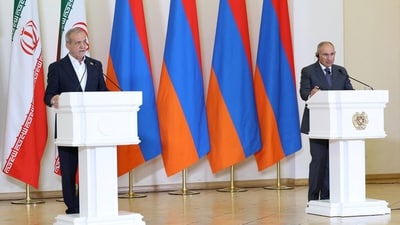 Armenian Prime Minister Nikol Pashinyan and Iranian President Masoud Pezeshkian address the media following their talks in Yerevan, Armenia, (REUTERS)