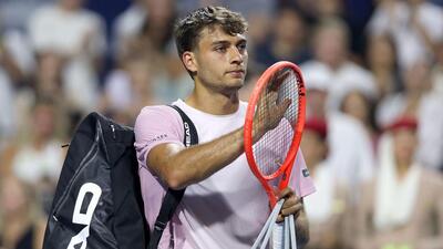 Flavio Cobolli of Italy leaves the court after losing to Ben Shelton during the National Bank Open. (Getty Images via AFP) Flavio Cobolli of Italy leaves the court after losing to Ben Shelton during the National Bank Open. (Getty Images via AFP)