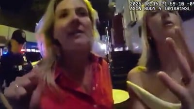 Special Assistant Attorney General Devon Hogan Flanagan and her friend, Veronica Hannan were arrested for trespassing. (X/@CollinRugg) Special Assistant Attorney General Devon Hogan Flanagan and her friend, Veronica Hannan were arrested for trespassing. (X/@CollinRugg)