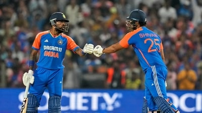 India's Hardik Pandya, left, and teammate Shivam Dube touch gloves (AP) India's Hardik Pandya, left, and teammate Shivam Dube touch gloves (AP)