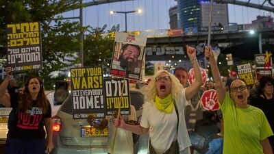 Supporters of Israeli hostages held in the Gaza Strip attend a rally demanding their release from Hamas captivity and calling for an end to the war. (AP) Supporters of Israeli hostages held in the Gaza Strip attend a rally demanding their release from Hamas captivity and calling for an end to the war. (AP)