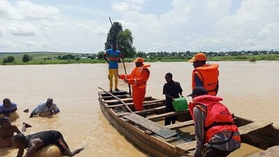 Rescue workers search for victims of a boat accident in Goronyo , northwest Nigeria, (AP/National Emergency Management Agency)