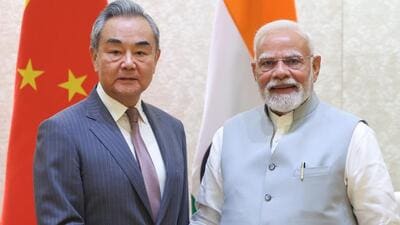 Prime Minister Narendra Modi with Chinese Foreign Minister Wang Yi during a meeting, in New Delhi. (@narendramodi via PTI) Prime Minister Narendra Modi with Chinese Foreign Minister Wang Yi during a meeting, in New Delhi. (@narendramodi via PTI)
