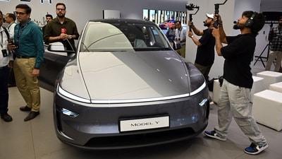 Tesla has launched its second India showroom, an 8,200 sq ft space at Worldmark 3 in Delhi’s Aerocity. (Photo for representational purposes only) (Photographer: Prakash Singh/Bloomberg) (Bloomberg) Tesla has launched its second India showroom, an 8,200 sq ft space at Worldmark 3 in Delhi’s Aerocity. (Photo for representational purposes only) (Photographer: Prakash Singh/Bloomberg) (Bloomberg)