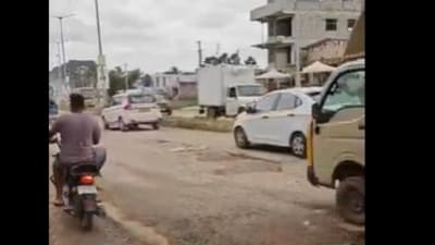 The video, shared by a resident, captures vehicles struggling to navigate deep potholes and uneven surfaces. (X/@bengalurupost1)
