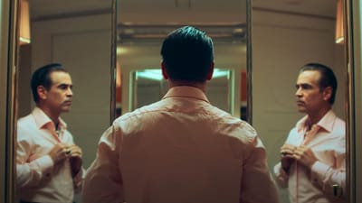 Colin Farrel's Lord Doyle suits up for a night of games in Macau's neon glow (Screengrab/Netflix) Colin Farrel's Lord Doyle suits up for a night of games in Macau's neon glow (Screengrab/Netflix)