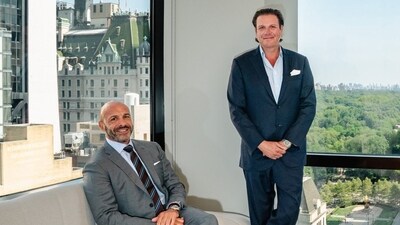 Dominari Holdings CEO Anthony Hayes, sitting, and President Kyle Wool at Trump Tower in New York. Dominari Holdings CEO Anthony Hayes, sitting, and President Kyle Wool at Trump Tower in New York.