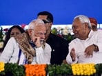 Prime Minister Narendra Modi in conversation with Bihar CM Nitish Kumar during a public meeting in Motihari. Prime Minister Narendra Modi in conversation with Bihar CM Nitish Kumar during a public meeting in Motihari.