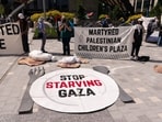 A "Stop Starving Gaza" sign during a protest at the Microsoft Campus in Redmond, Washington as employees rallied at the company to increase pressure on the software maker to stop doing business with Israel.