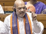 Union home minister Amit Shah speaks in the Lok Sabha during the Monsoon session of Parliament, in New Delhi on Wednesday,
