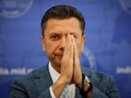 Roman Babushkin, charge d'affaires at the Russian embassy in India, gestures during a press conference in New Delhi, on August 20, 2025. 